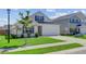 Charming two-story home with a well-maintained lawn, a garage, and a classic architectural style at 134 Percheron Dr, Summerville, SC 29486