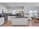 Modern kitchen with stainless steel appliances, granite countertops, and a spacious center island at 134 Percheron Dr, Summerville, SC 29486