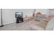 Spacious living room with lots of light and gray wood-look flooring at 134 Percheron Dr, Summerville, SC 29486