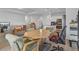 Bright open-concept living room showcases neutral walls, wood floors, and access to a modern kitchen at 134 Percheron Dr, Summerville, SC 29486
