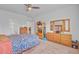 Comfortable main bedroom with a ceiling fan and ample natural light at 134 Percheron Dr, Summerville, SC 29486