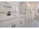 Bathroom features dual vanity sinks with white quartz countertops and modern fixtures at 1340 Lucinda St, Mount Pleasant, SC 29466