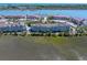 Aerial view of waterfront condos and marina for boat access and water views at 142 Marsh View Villas, Folly Beach, SC 29439