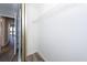 Walk-in closet features mirrored doors and wire shelving for optimal storage at 142 Marsh View Villas, Folly Beach, SC 29439