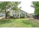 Expansive backyard with mature trees showcasing exterior elevation at 149 Daniels Ridge Dr, Summerville, SC 29485