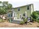 Expansive backyard featuring a spacious deck, ideal for outdoor relaxation and entertainment at 149 Daniels Ridge Dr, Summerville, SC 29485