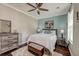Comfortable bedroom features a ceiling fan, decorative rug, and rustic wood furnishings at 149 Daniels Ridge Dr, Summerville, SC 29485