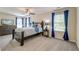 Cozy bedroom with a ceiling fan, soft carpet, and a large window for plenty of natural light at 149 Daniels Ridge Dr, Summerville, SC 29485