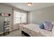 Neutral bedroom with a plush carpet, window with blinds, and a closet with a door at 149 Daniels Ridge Dr, Summerville, SC 29485
