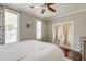 Bright bedroom with natural light, hardwood floors, and french doors to the outside at 149 Daniels Ridge Dr, Summerville, SC 29485