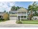 Charming home featuring a two-story porch, landscaped yard, and inviting curb appeal at 149 Daniels Ridge Dr, Summerville, SC 29485