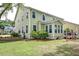 Charming home exterior featuring lush landscaping, mature trees, and well-maintained grounds, creating an inviting curb appeal at 149 Daniels Ridge Dr, Summerville, SC 29485