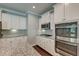Close-up of the modern kitchen appliances and granite countertops at 149 Daniels Ridge Dr, Summerville, SC 29485