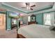 Main bedroom showcasing a decorative wood dresser and large mirror with a flat screen television at 149 Daniels Ridge Dr, Summerville, SC 29485