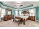 Spacious main bedroom with a tray ceiling, ceiling fan, and decorative wood furniture at 149 Daniels Ridge Dr, Summerville, SC 29485