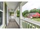 Enjoy views from this second story porch with seating at 149 Daniels Ridge Dr, Summerville, SC 29485