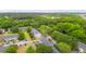 Aerial view of community featuring multiple townhomes surrounded by trees and landscaping at 153 Heritage Cir # K3, Mount Pleasant, SC 29464