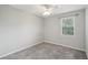 Clean and neutral bedroom with a ceiling fan and window at 153 Heritage Cir # K3, Mount Pleasant, SC 29464