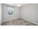 Neutral bedroom with a window, blinds, light gray walls, and carpeted floors at 153 Heritage Cir # K3, Mount Pleasant, SC 29464