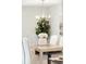 Cozy dining room featuring a modern chandelier, neutral decor, and hardwood floors at 153 Heritage Cir # K3, Mount Pleasant, SC 29464