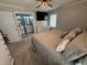 Comfortable bedroom with soft carpet, a large bed, and an ensuite bathroom offering convenience and modern amenities at 1606 Waterside Blvd, Moncks Corner, SC 29461