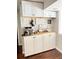 Charming coffee bar with a coffee machine, storage, and decorated with wall art at 1606 Waterside Blvd, Moncks Corner, SC 29461