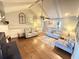 Living room featuring hardwood floors, neutral paint, vaulted ceilings and lots of natural light at 1606 Waterside Blvd, Moncks Corner, SC 29461