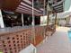 The outdoor bar offers seating at the bar, hanging swings, and decorations creating a fun atmosphere at 1606 Waterside Blvd, Moncks Corner, SC 29461