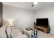 Bedroom featuring a sitting area with a TV stand with funko pops and a neutral colored couch at 167 Cherry Grove Dr, Summerville, SC 29483