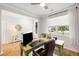 Bright home office with light wood floors, a large window, and a desk with modern computer equipment at 167 Cherry Grove Dr, Summerville, SC 29483