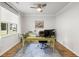 Bright home office with light wood floors, a large window and a desk with modern computer equipment, offering a functional workspace at 167 Cherry Grove Dr, Summerville, SC 29483