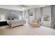 Serene main bedroom with large windows, soft carpet, and a sitting area perfect for relaxation at 167 Cherry Grove Dr, Summerville, SC 29483