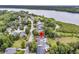Tranquil aerial perspective of the property with lake views and mature trees at 1711 Indigo Island Dr, Hanahan, SC 29410