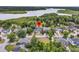 Aerial shot of a residential area with a well-manicured lawn and stunning lake view at 1711 Indigo Island Dr, Hanahan, SC 29410