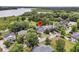Overhead view of a beautiful home nestled among mature trees in a tranquil neighborhood at 1711 Indigo Island Dr, Hanahan, SC 29410