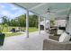 Fully equipped backyard with outdoor furniture, a grill, fire pit, and beautiful water view at 1711 Indigo Island Dr, Hanahan, SC 29410