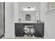 Bright vanity with dual drawers, stool, large mirror and modern lighting at 1711 Indigo Island Dr, Hanahan, SC 29410