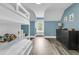 Stylish bedroom with bunk beds, blue accent wall, and ample storage space at 1711 Indigo Island Dr, Hanahan, SC 29410