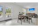 Casual dining area featuring a round table, seating for four, and a view of the outdoor space at 1711 Indigo Island Dr, Hanahan, SC 29410
