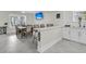 Open dining room with a breakfast bar, dining table, and kitchen access at 1711 Indigo Island Dr, Hanahan, SC 29410