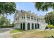 Charming two-story home with a covered porch, garage, and manicured lawn in a desirable neighborhood at 1711 Indigo Island Dr, Hanahan, SC 29410