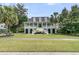 Inviting two-story house showcasing well-maintained landscaping and an expansive lawn at 1711 Indigo Island Dr, Hanahan, SC 29410