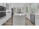 Modern kitchen with stainless steel appliances, a large island, and plenty of natural light at 1711 Indigo Island Dr, Hanahan, SC 29410