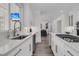 Bright kitchen featuring white cabinets, stainless steel appliances, and an open layout at 1711 Indigo Island Dr, Hanahan, SC 29410