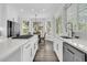 Bright kitchen featuring white cabinets, stainless steel appliances, and an open layout at 1711 Indigo Island Dr, Hanahan, SC 29410