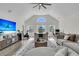 Spacious living room featuring a vaulted ceiling, comfortable seating, and an office area at 1711 Indigo Island Dr, Hanahan, SC 29410