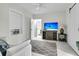Cozy living room with comfortable seating, a flat-screen TV, and a modern design at 1711 Indigo Island Dr, Hanahan, SC 29410