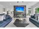 Bright and airy living room featuring an open layout with fireplace and comfortable seating at 1711 Indigo Island Dr, Hanahan, SC 29410