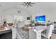 Bright, modern living room with vaulted ceilings, comfortable seating and a large screen television at 1711 Indigo Island Dr, Hanahan, SC 29410