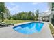 Relaxing pool view on a sunny day, perfect for summer relaxation, with plenty of space for lounging at 1711 Indigo Island Dr, Hanahan, SC 29410